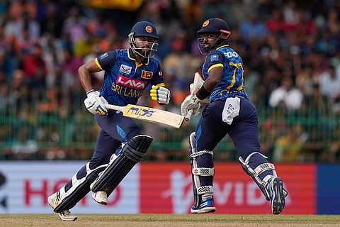 Sadeera Samarawickrama, left, and Charith Asalanka run between the wickets during 2nd ODI
